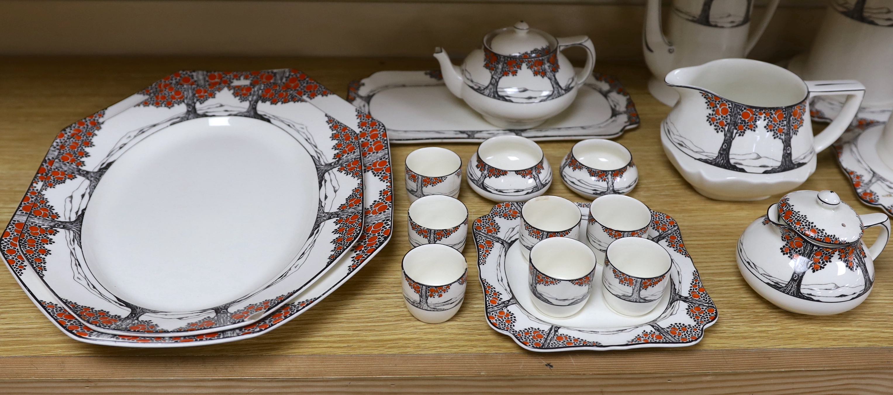 A large quantity of Crown Ducal Orange Tree pattern tea, coffee and dinner wares